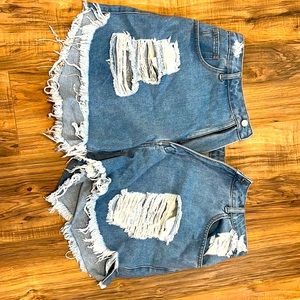 Distressed denim shorts